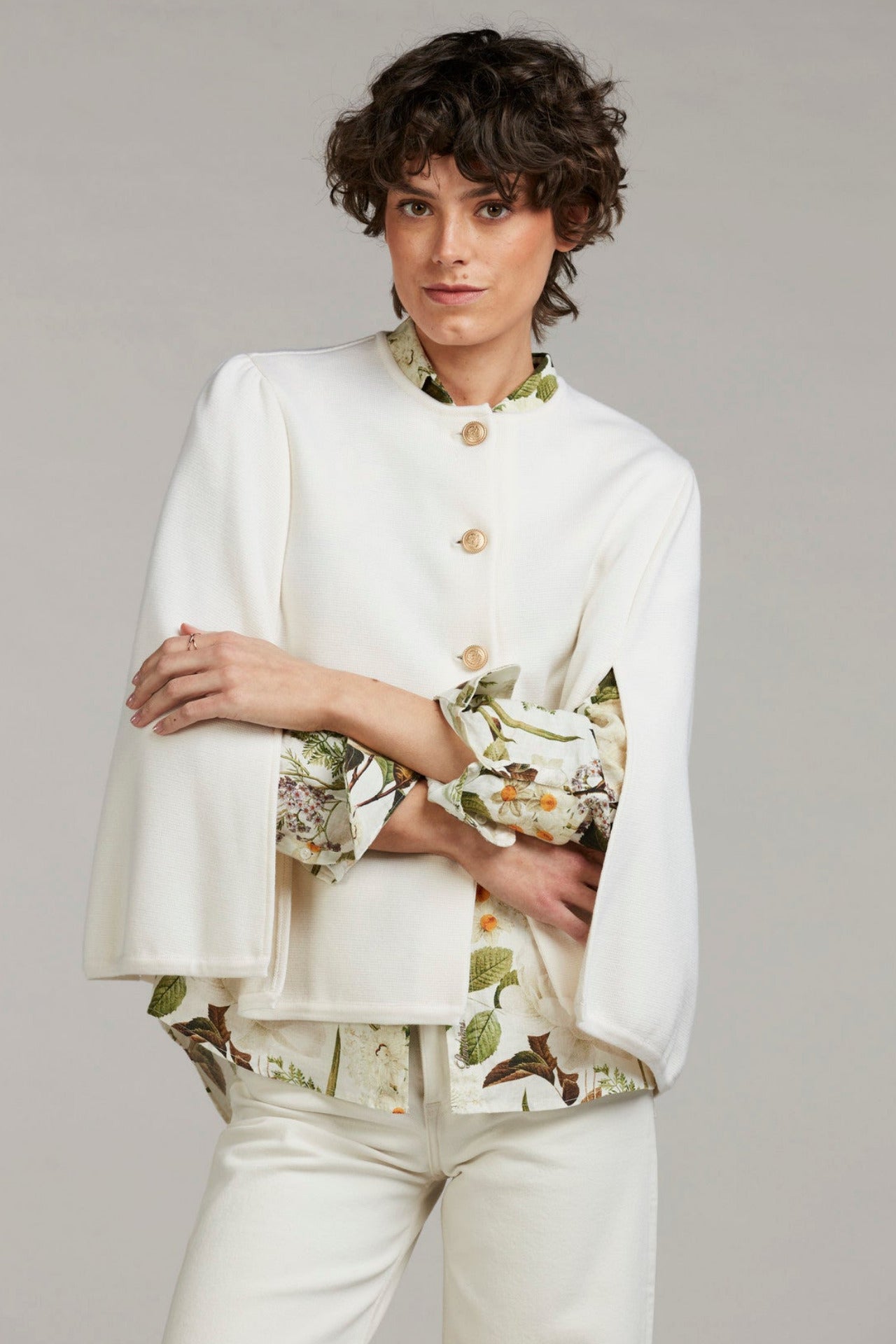 Vit stickad poncho - Stenströms