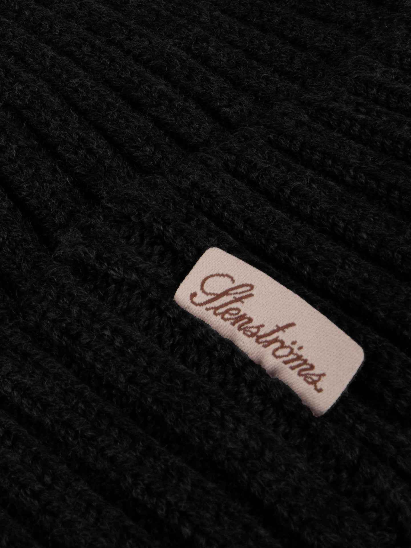 Ribbstickad Merino Mössa