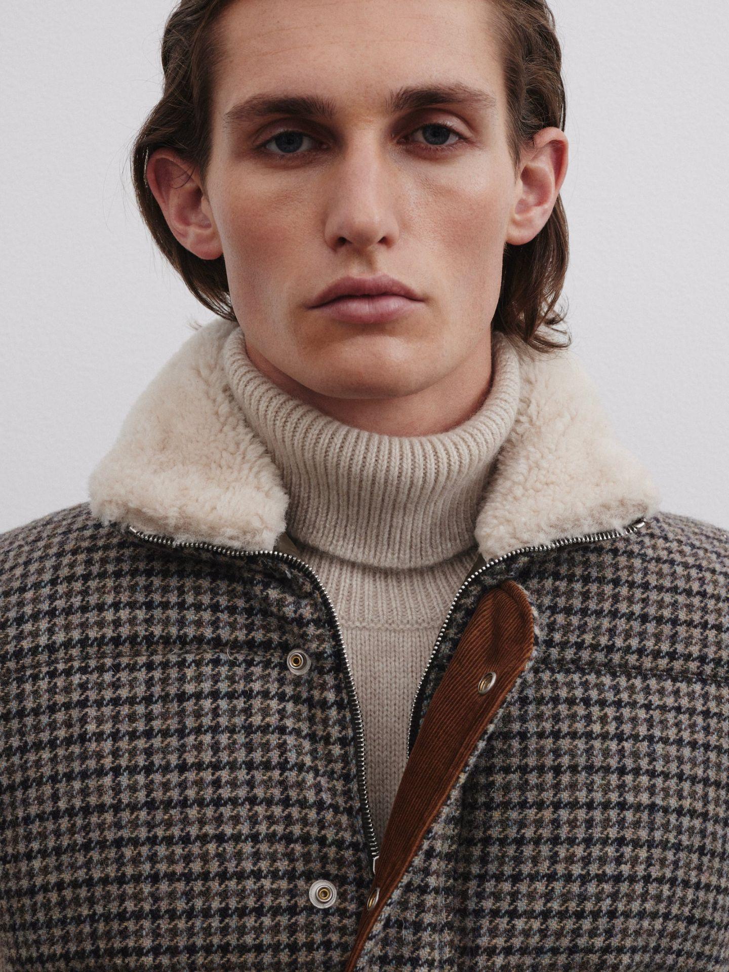 Hundtandsmönstrad Sheerling Ullväst