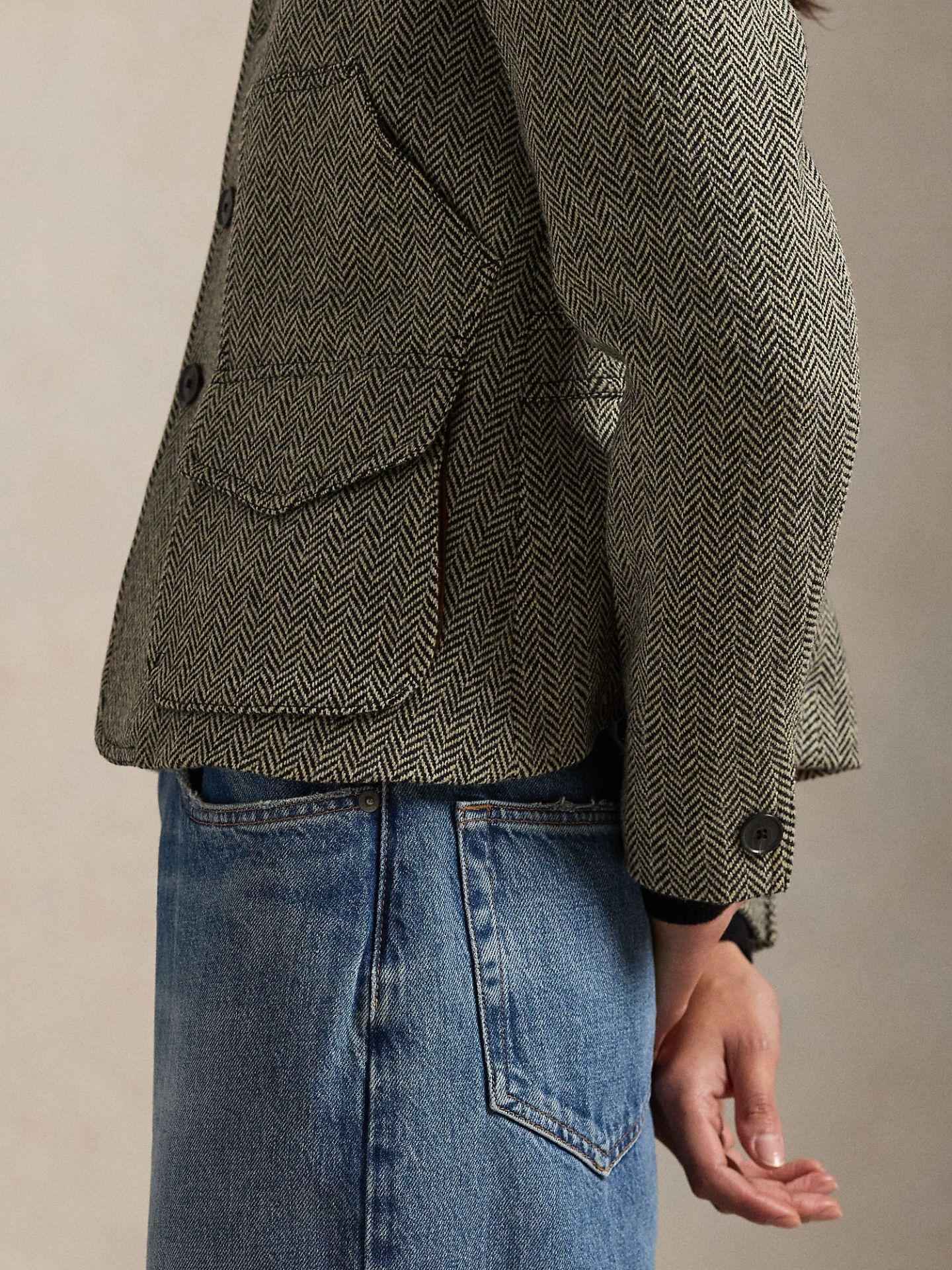 Jacka med Mockadetaljer